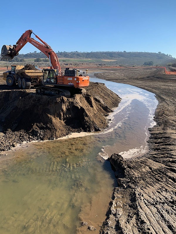 Tractor restoring lagoon wetland area at the San Dieguito Lagoon east of Interstate 5.